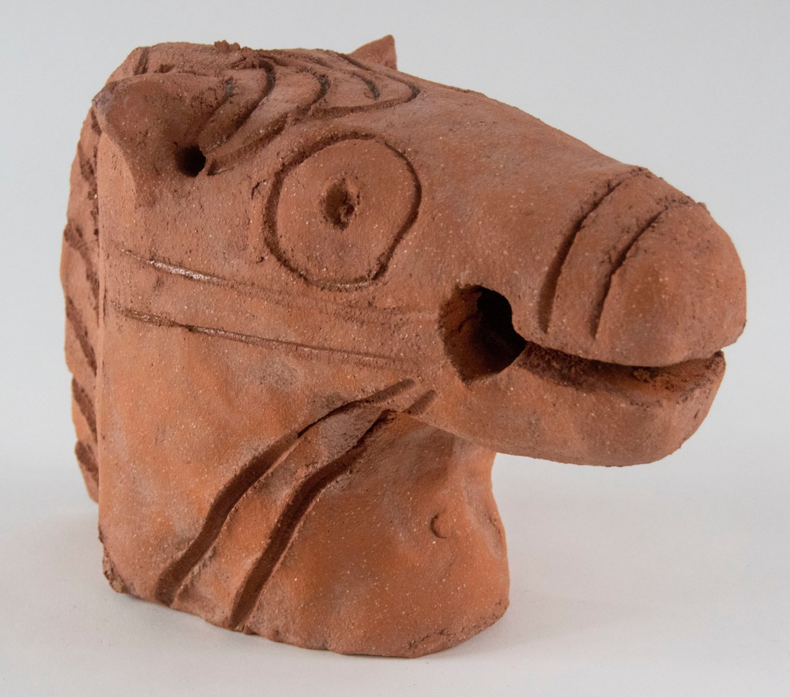 A ceramic horse head by artist Reniel Del Rosario.