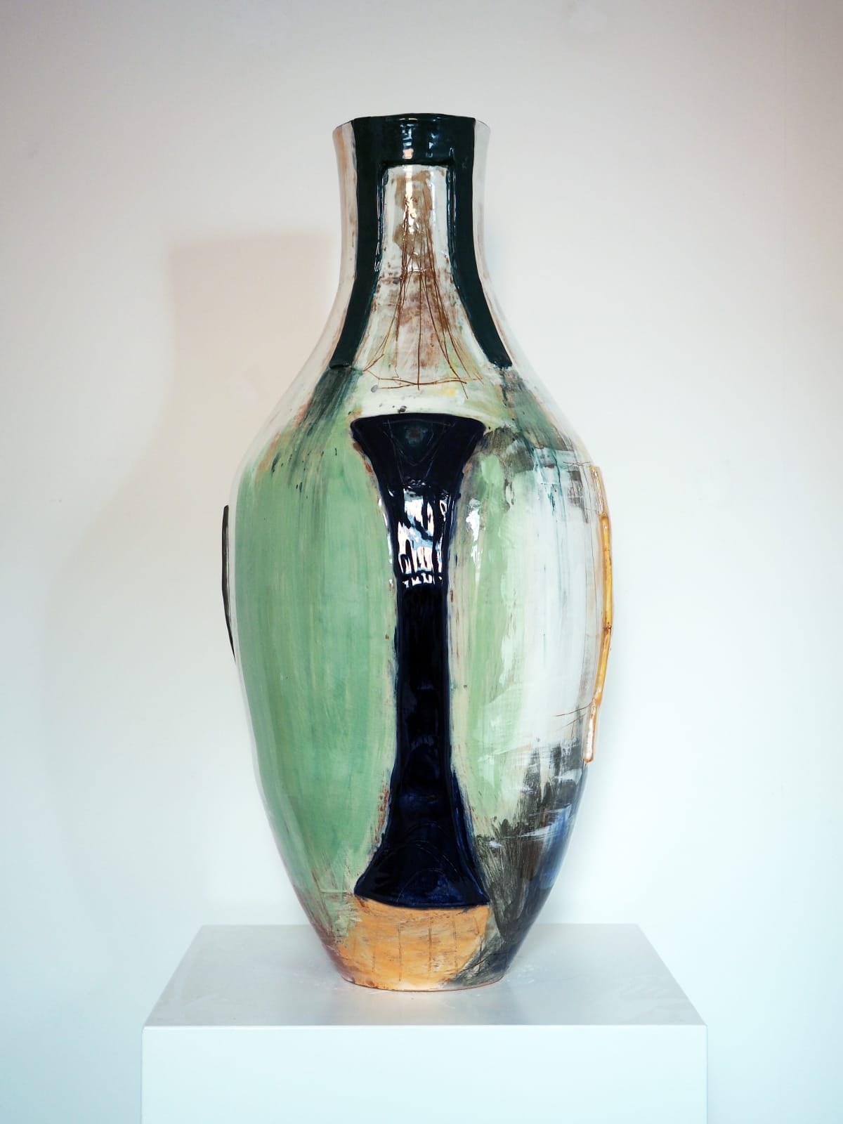 Turquoise abstract ceramic vessel by Danish artist Morten Lassen, featuring organic shapes and a textured, painterly surface.