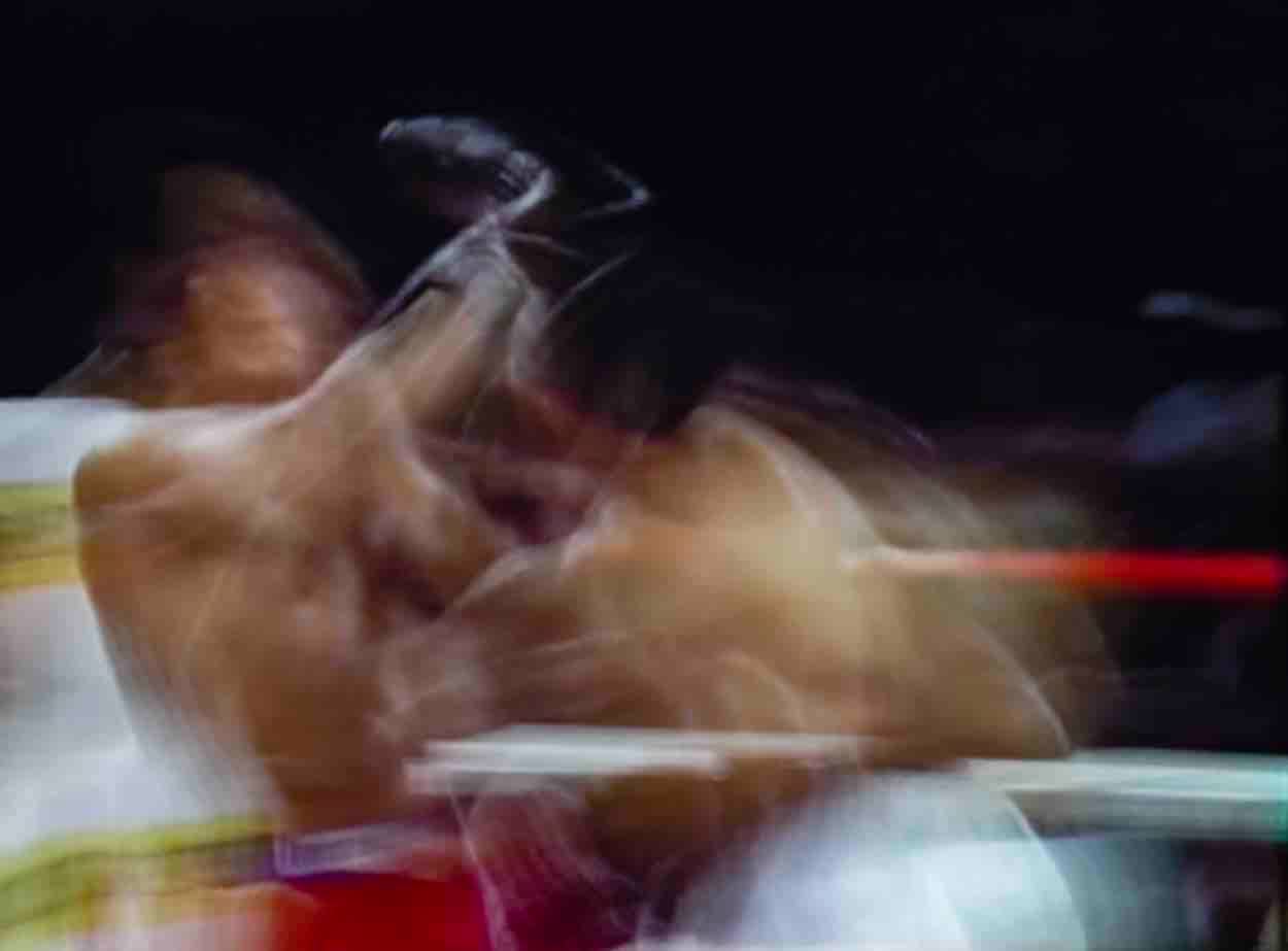Jason Shulman chromogenic print of Muhammed Ali punching George Foreman with black background