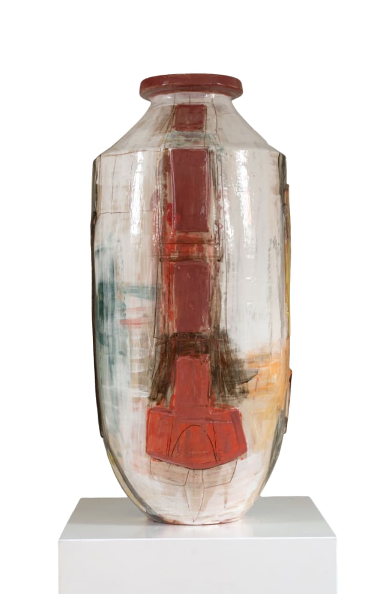 Dark orange abstract ceramic vessel by Danish artist Morten Lassen, featuring organic shapes and a textured, painterly surface.