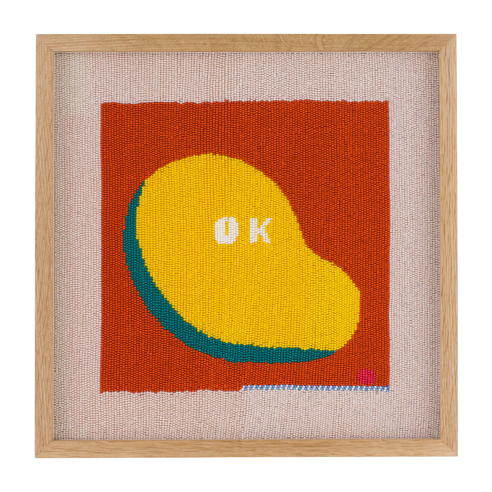 Rose Blake red hand embroidery of OK on a mango