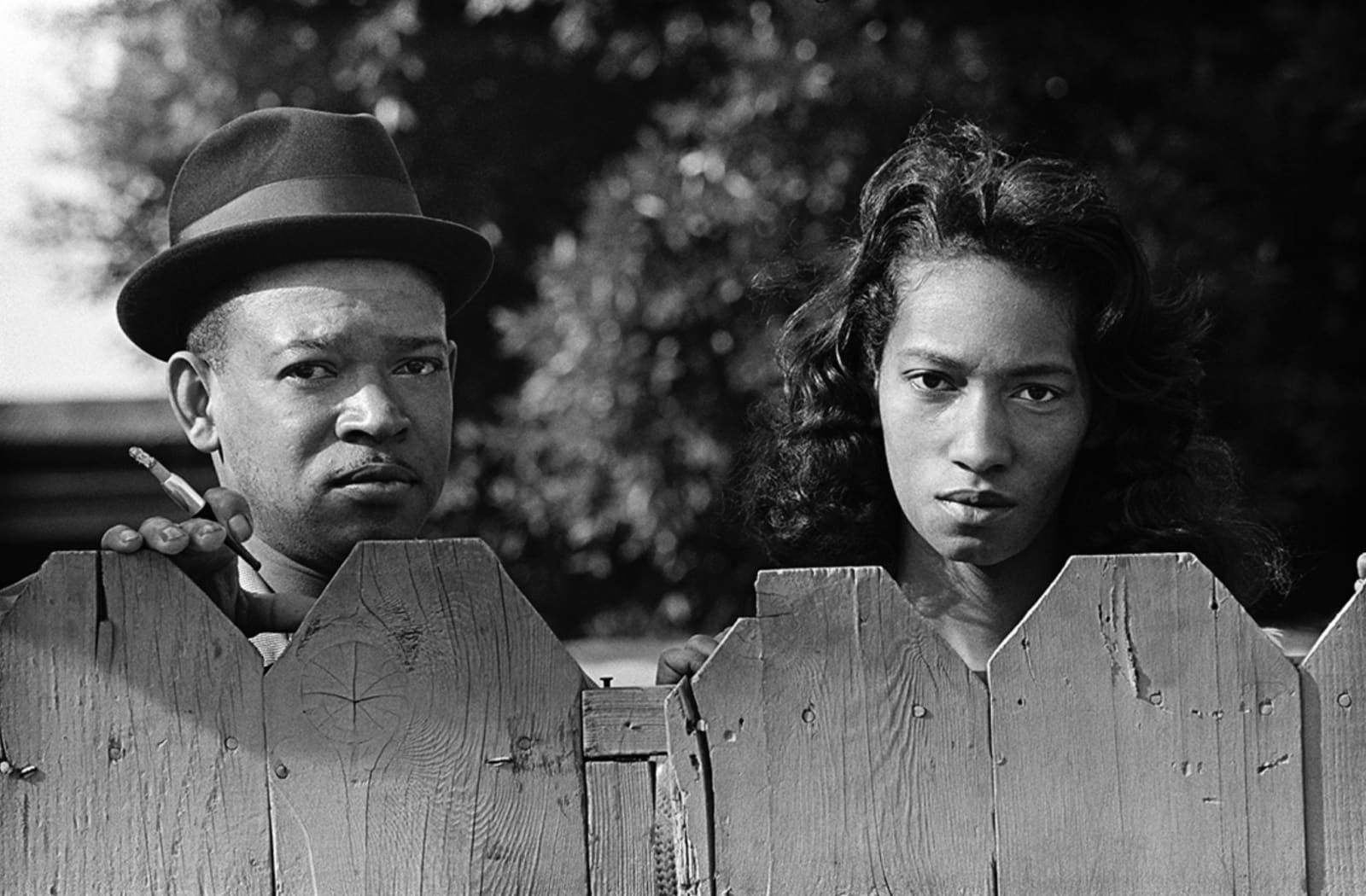 Jim Marshall, a black couple looking over a fence