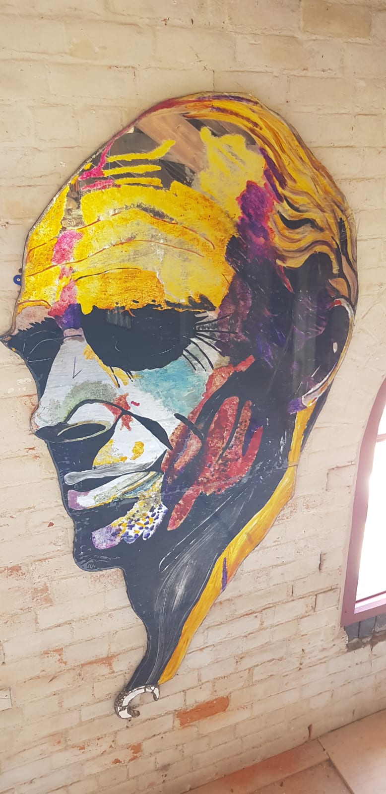 Colorful self portrait by British sculptor Andrew Logan available at the Rebecca Hossack Art Gallery.
