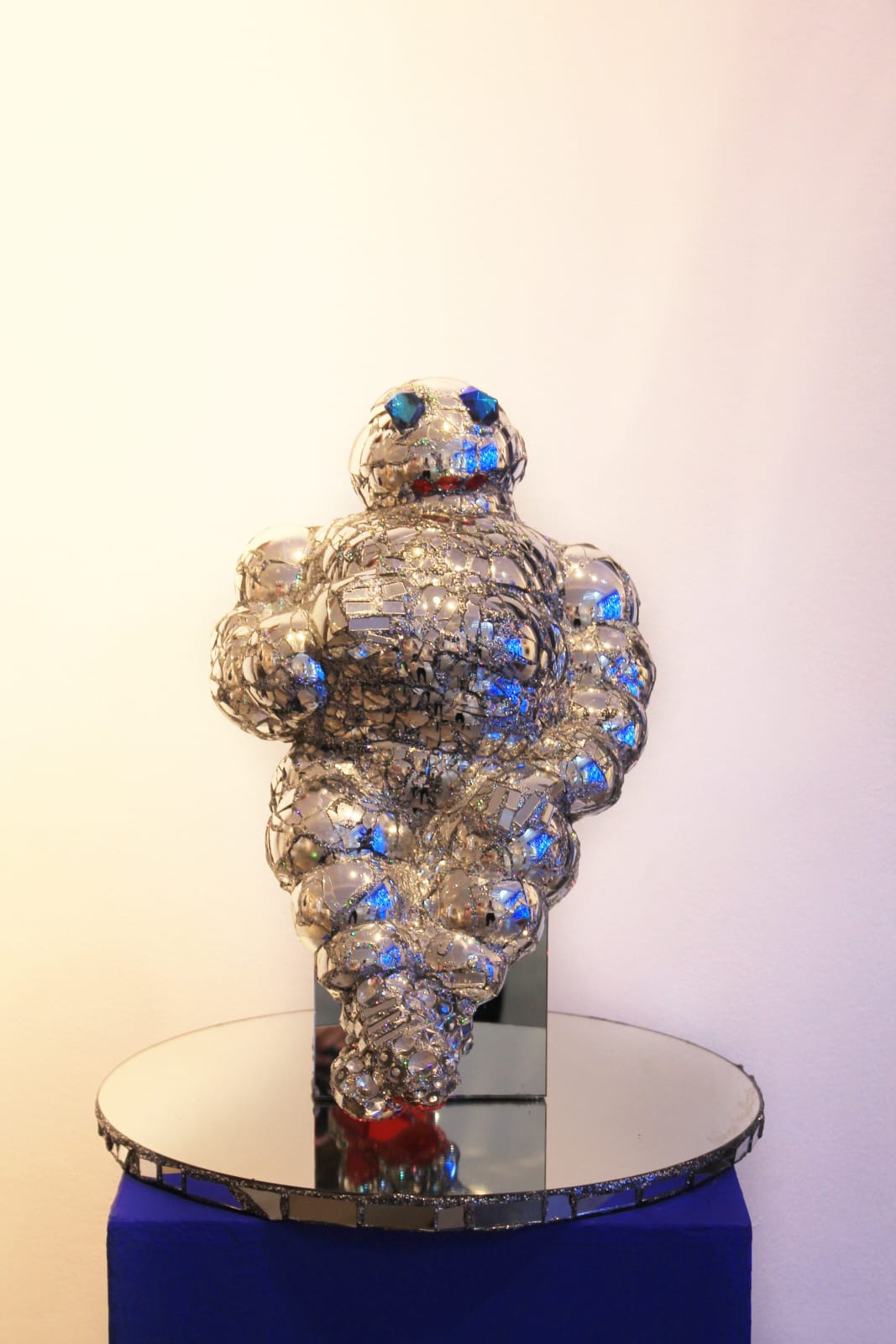 Eclectic British artist Andrew Logan's metallic mirrored sculpture