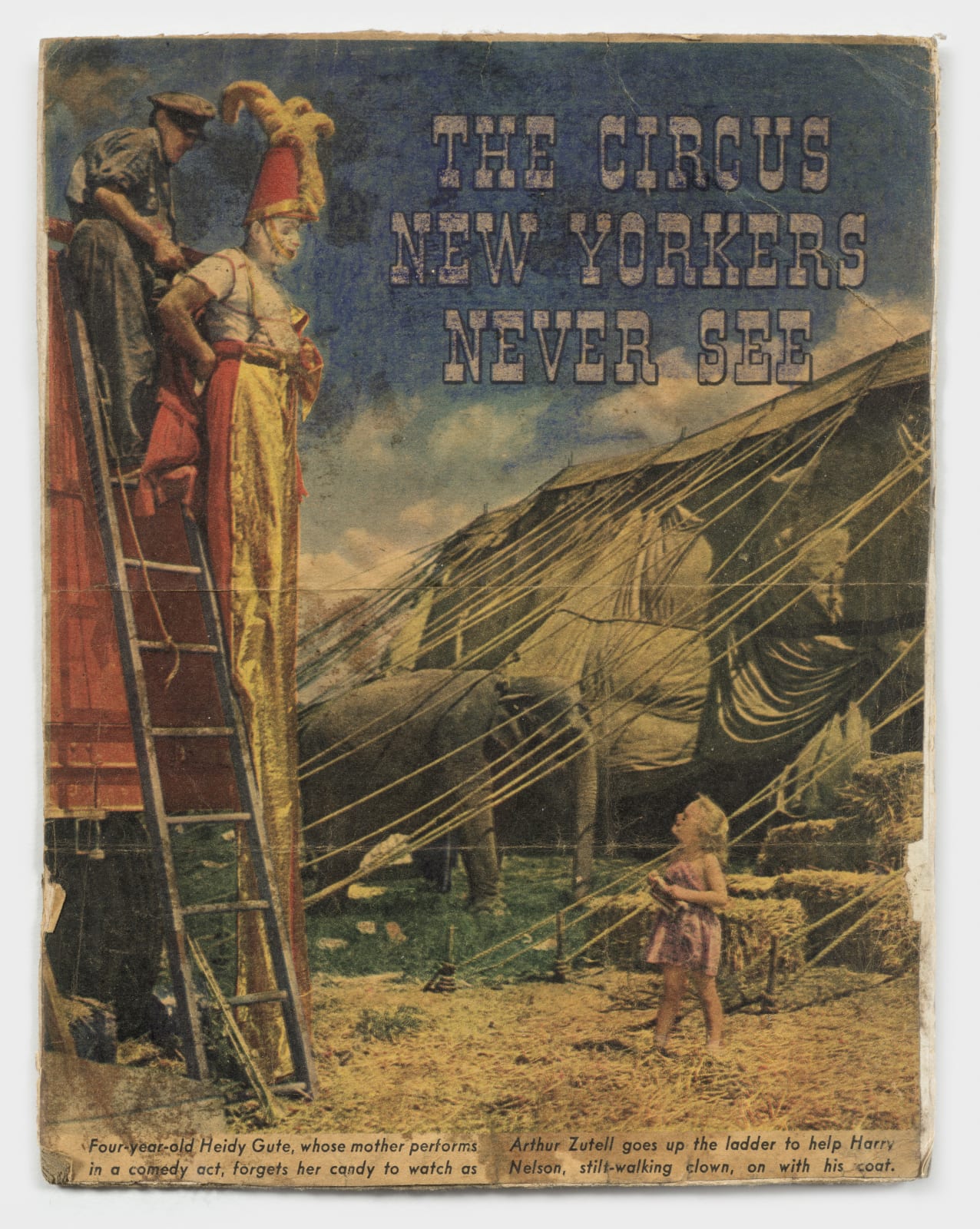 Colorful depiction of a little girl looking up at a man in white makeup on yellow and red stilts. A man is on a ladder next to him and there is an elephant in the background. Large white letters read 