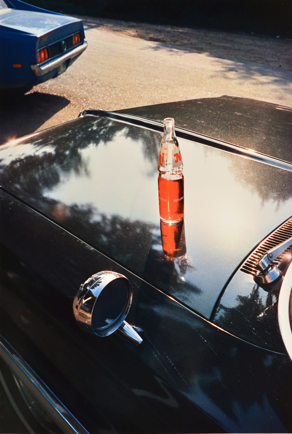 William Eggleston, "Tennessee", ca. 1971-74 (nehi bottle on car hood). From The Los Alamos Portfolio, 2002