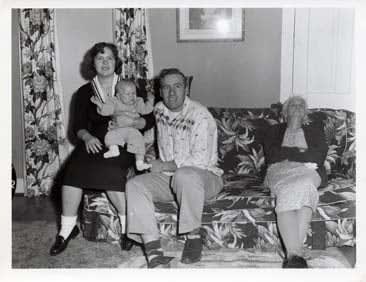 ENLARGEMENT REPRINT Vernacular, Untitled (Dealer title: "Three Generations of Midwest Family" - three people on a couch with a baby)