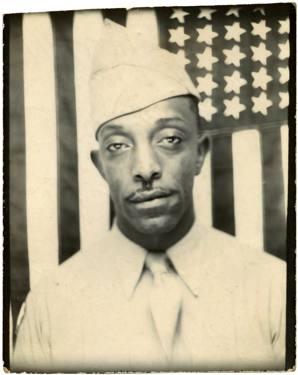 ENLARGEMENT REPRINT Vernacular, Untitled (Photobooth Military Man in uniform Flag)