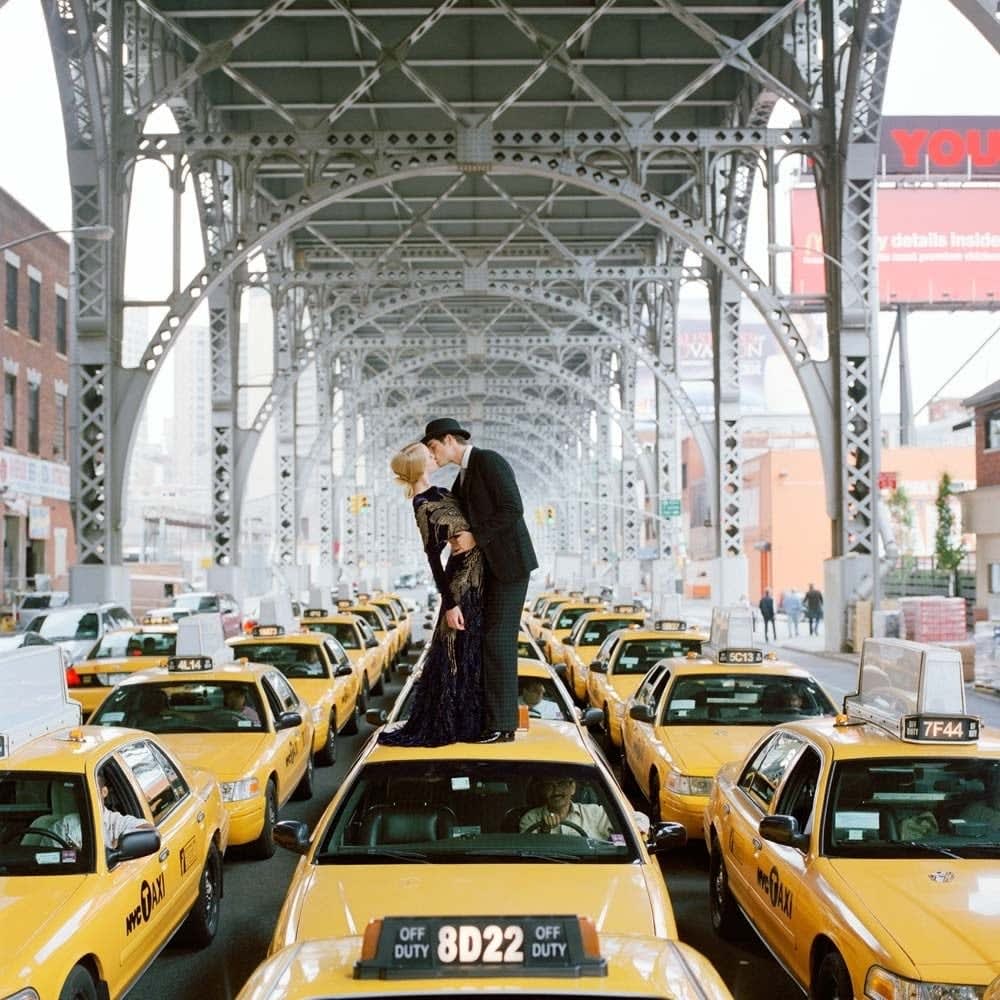 Rodney Smith, Edythe and Andrew Kissing on Top of Taxis, New York City, 2008/2022