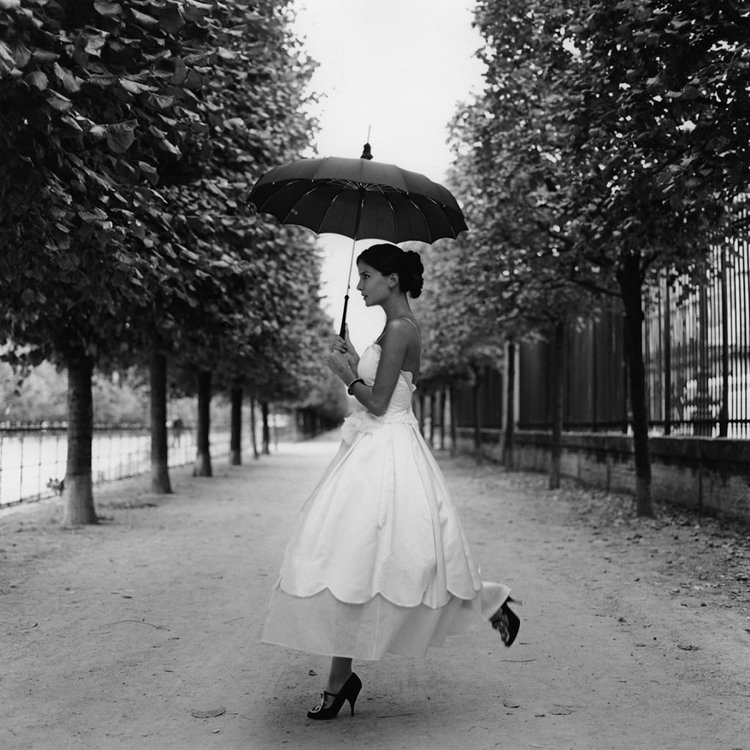 Rodney Smith, Mira skipping with umbrella, Paris, France, 2007