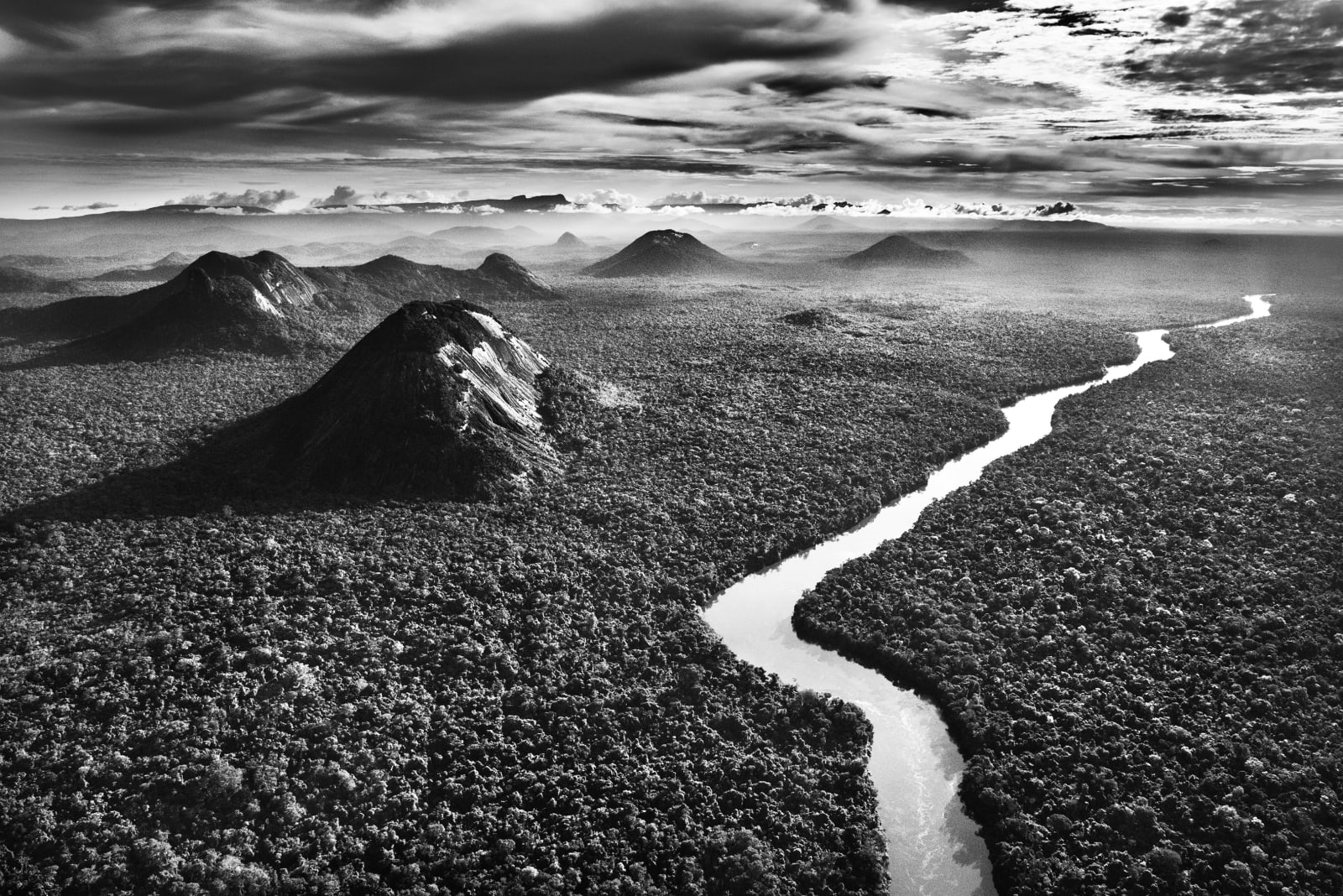 Sebastião Salgado, The Demini River is a tributary of the Rio Negro and flows through the Yanomami Indigenous Territory, bordering...