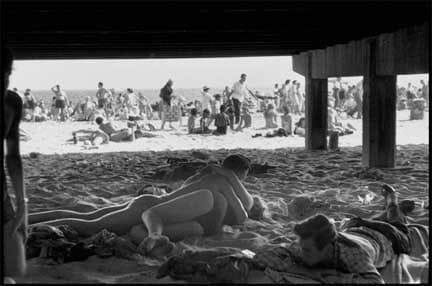 Bruce Davidson, Couple Entwined Under Coney Island Boardwalk, 1959