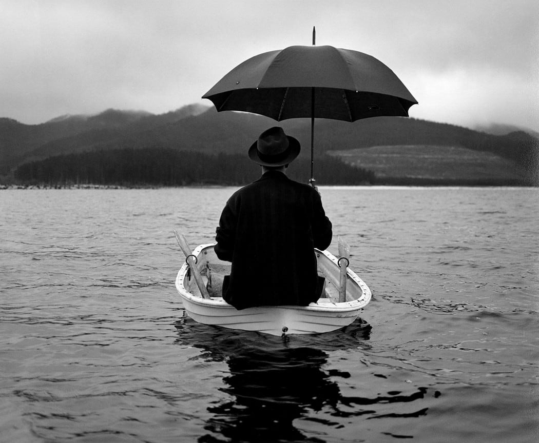Rodney Smith, Man with Umbrella in boat from behind, Capetown, South Africa, 1998