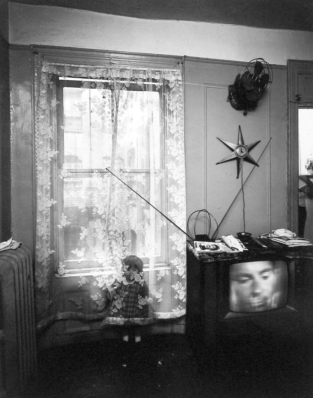 Bruce Davidson, East 100th Street (girl behind curtain with TV on), 1966-1968