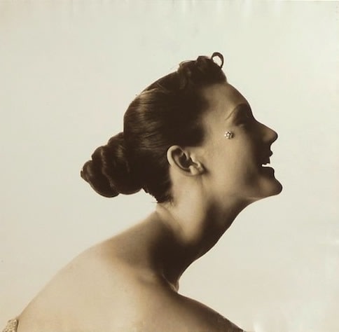 Irving Penn, Woman with Cheek Jewelry, c. 1949