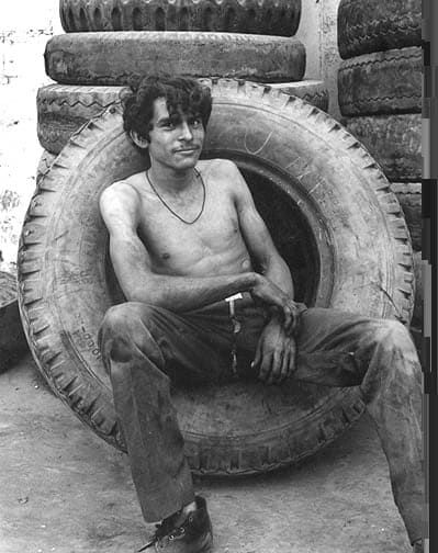 Danny Lyon, Tzamunchale, Mexico (Boy in Tire), 1973