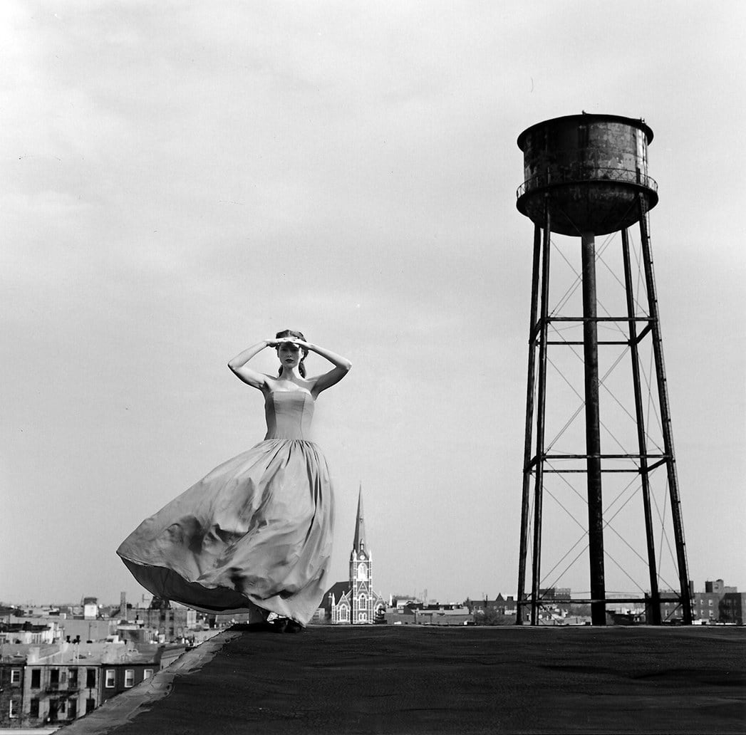 Rodney Smith, Viktoria Standing on Roof near Water Tower, Brooklyn, New York