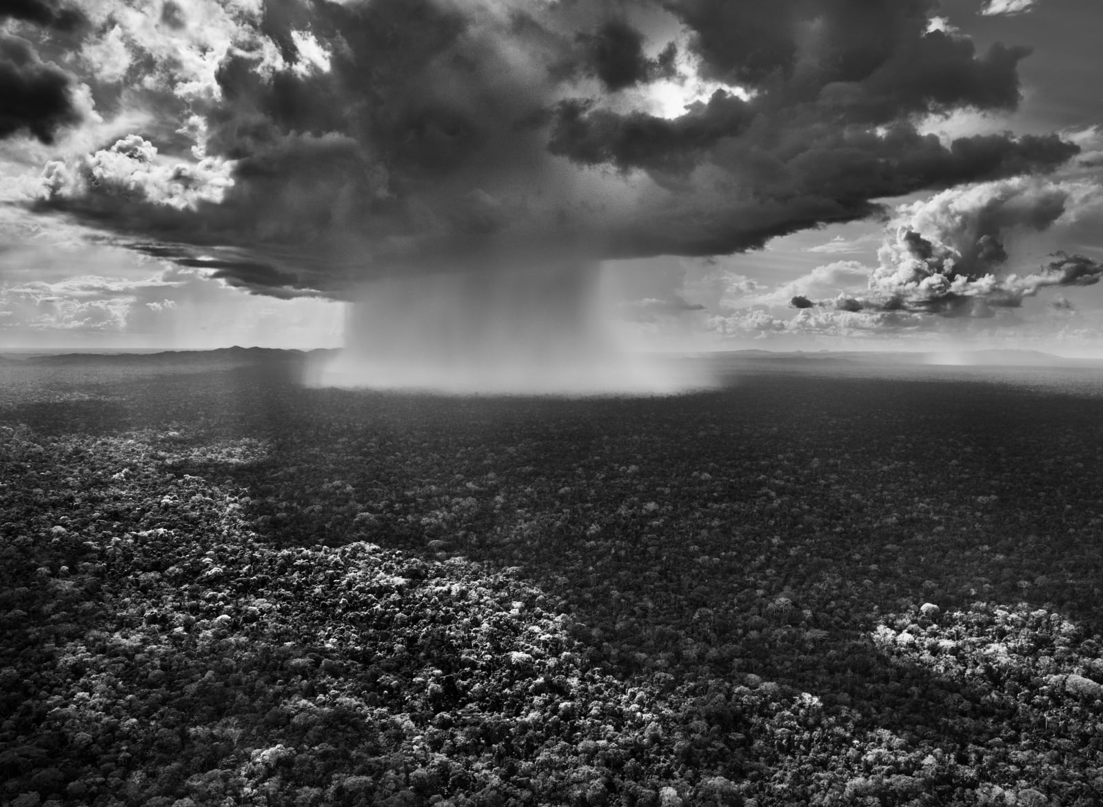 Sebastião Salgado, Mushroom cloud rain. Sierre do Divisor Nat'l Park, 2016