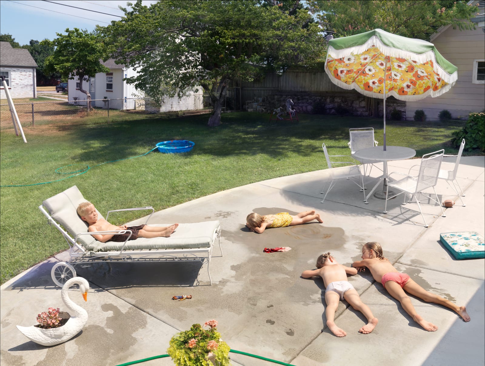 Julie Blackmon, Laying Out, 2015