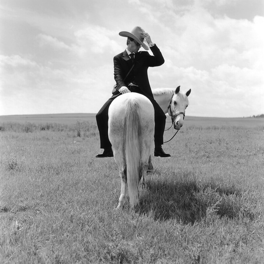 Rodney Smith, Greg on horse backwards, Alberta, Canada