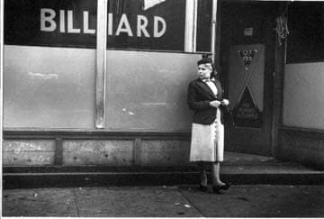 Helen Levitt, Untitled, New York (woman in front of billiard parlor), 1939