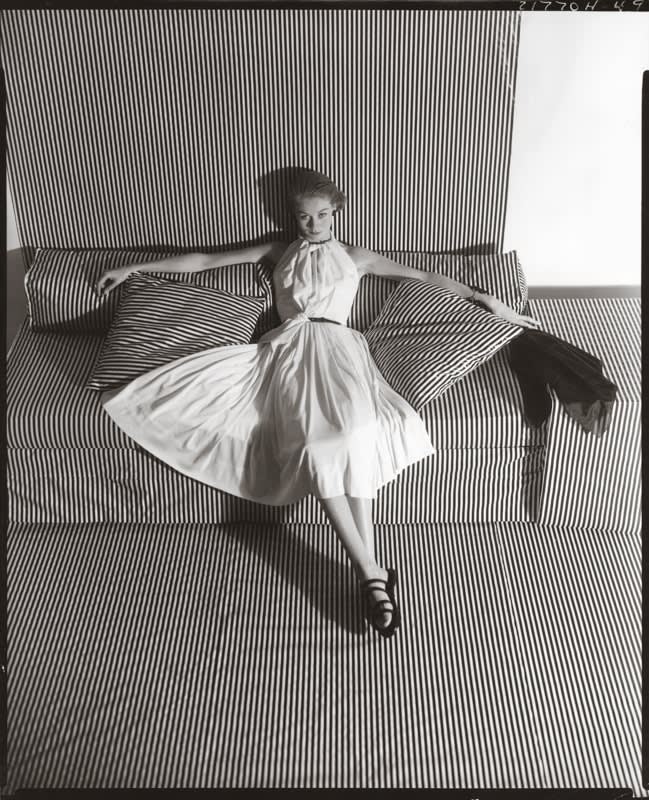 Horst P. Horst, White Dress on Striped Sofa II, October 19, 1951