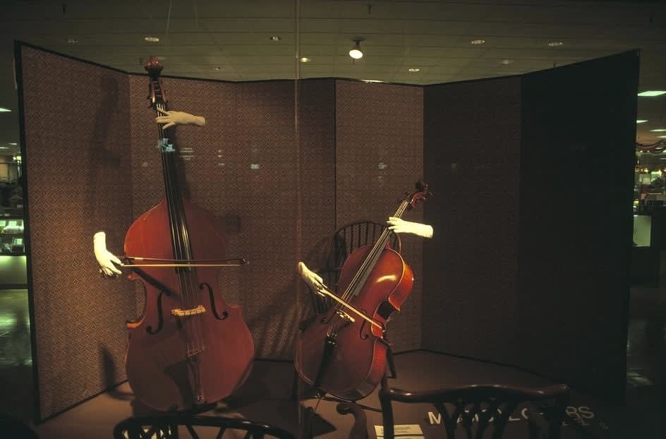 Alex Webb, Houston, Texas (disembodied hands playing to cellos), 1981