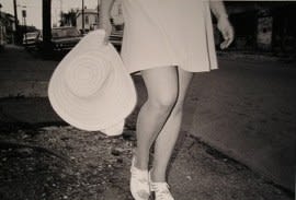 Mark Cohen, Woman with Hat, Short Skirt, North Washington Street, Wilkes-Barre, Pennsylvania, USA, 1974