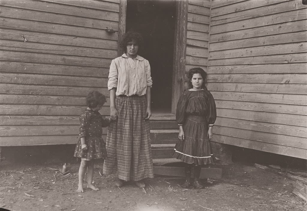 Lewis Wickes Hine, Woman and Two Children in Front of Mill, c. 1908