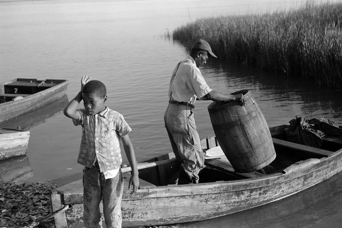 Constantine Manos, Island Boy, Daufuskie Island, South Carolina (boy and man with rowboat), 1952