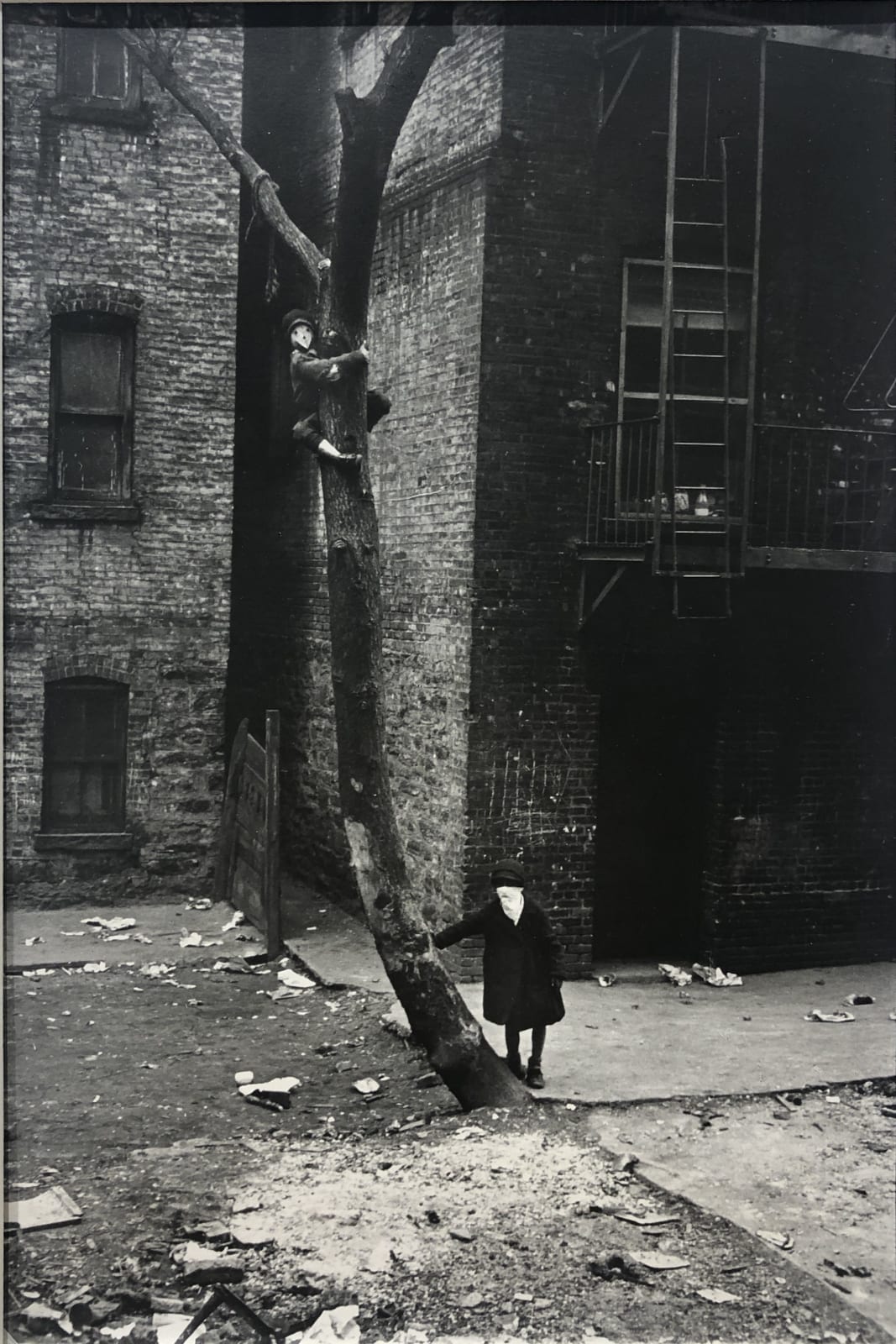 Helen Levitt, Untitled (Masks in Tree), New York City, New York, c. 1940
