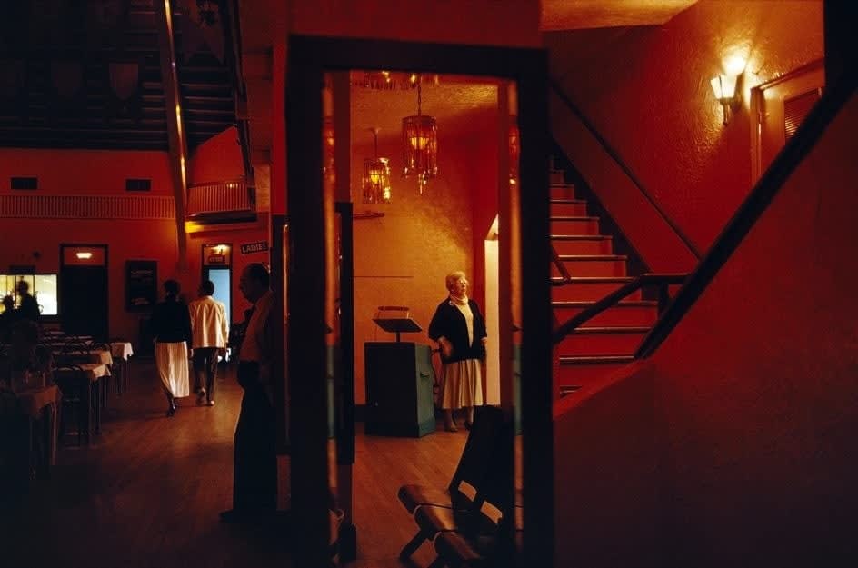 Alex Webb, St. Petesburgh, Fla (old folks/dining hall/red), 1989