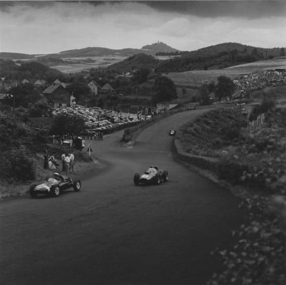 Jesse Alexander, Peter Collins followed by Mike Hawthorn at Nurburgring in Ferraris, 1958