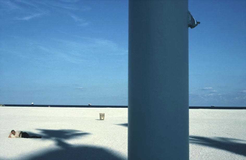 Alex Webb, Miami Beach (man reclining on beach), 1988