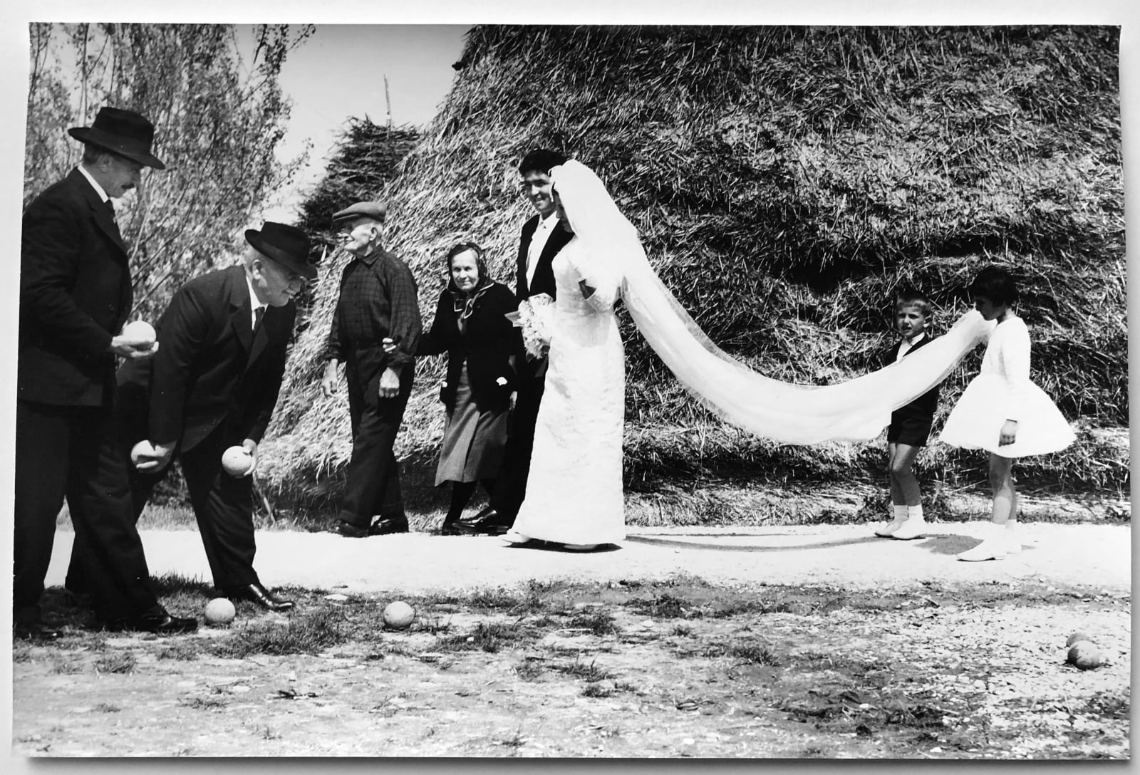 Mario Giacomelli, La Buona Terra (Wedding Gown, Bocce Players), 1964