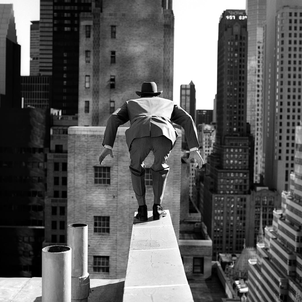 Rodney Smith, Alan leaping from 515 Madison Avenue, New York City, 1999