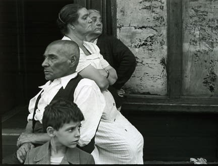 Helen Levitt, Untitled, Mexico (two women, a man and a boy on stoop), c. 1940