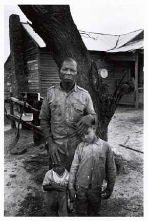 Bruce Davidson, Frank Haralson With His Sons, Isaiah and Ira, Alabama, 1965