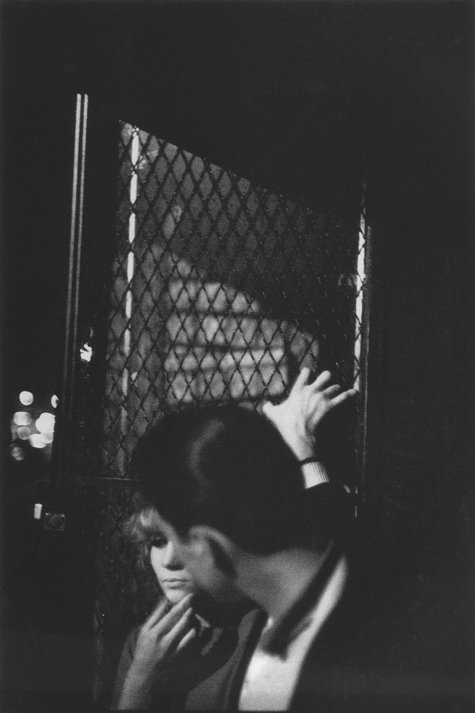 Bruce Davidson, Brooklyn Gang (Cathy and young man in the shadows), 1959