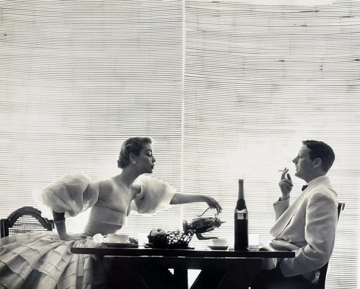 Irving Penn, Couple at Table with Woman Pouring Coffee, c.1960