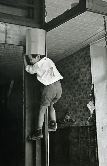 Helen Levitt, Untitled, New York (boy with box on head), 1940