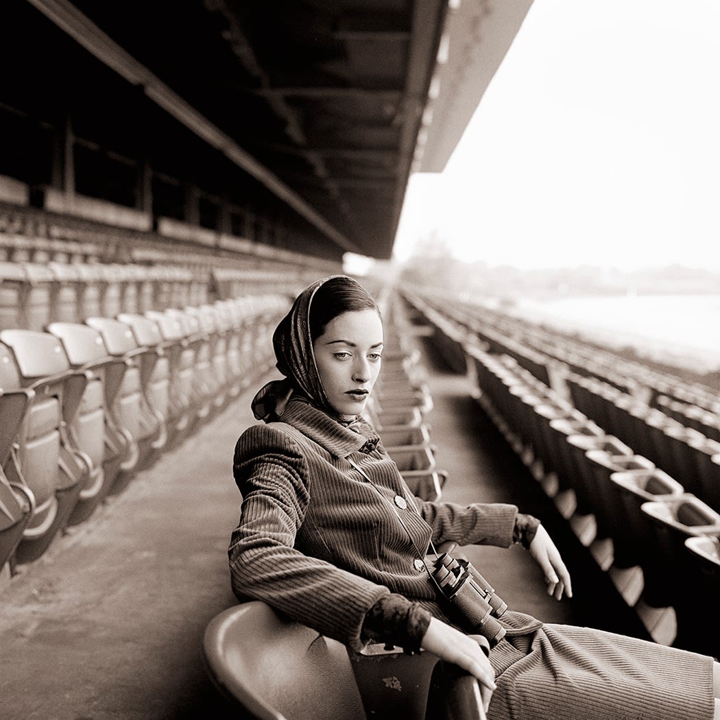 Rodney Smith, Shirley seated in grandstand, Long Island, New York, 1995