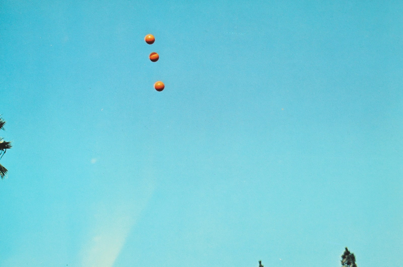 John Baldessari, Throwing Three Balls in the Air to Get a Straight Line Best of 36 Attempts