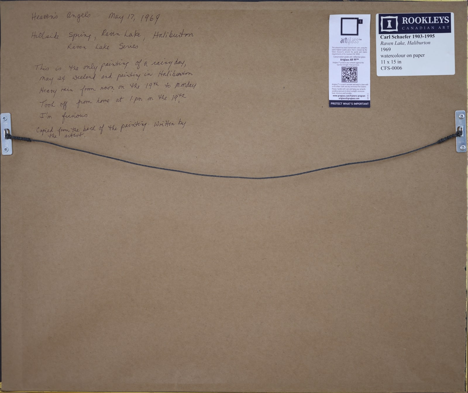 The back of The painting portrays a landscape with a variety of textures and colours that capture the rugged terrain of Haliburton.