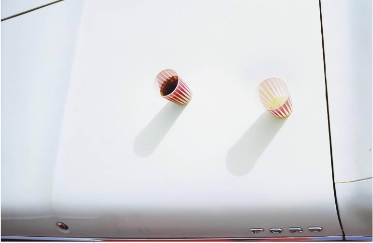 William Eggleston, Untitled, [white car hood with party cups ], 1971