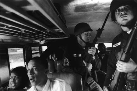 Bruce Davidson, Untitled [soldiers on the bus, bayonets raised], Alabama, A Time of Change, 1961