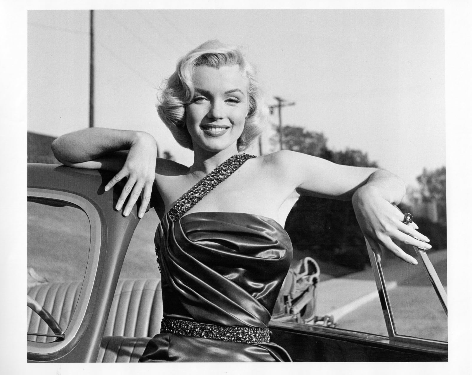 Frank Worth, Marilyn Monroe with a Vintage Car, 1953
