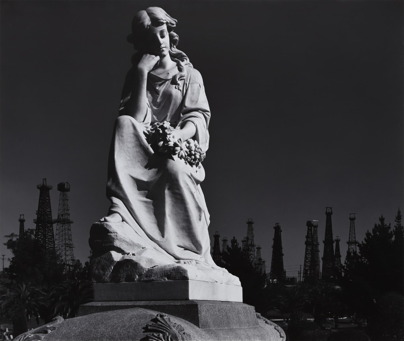 Ansel Adams, Cemetery Statue and Oil Derricks, Signal Hill, CA, 1939