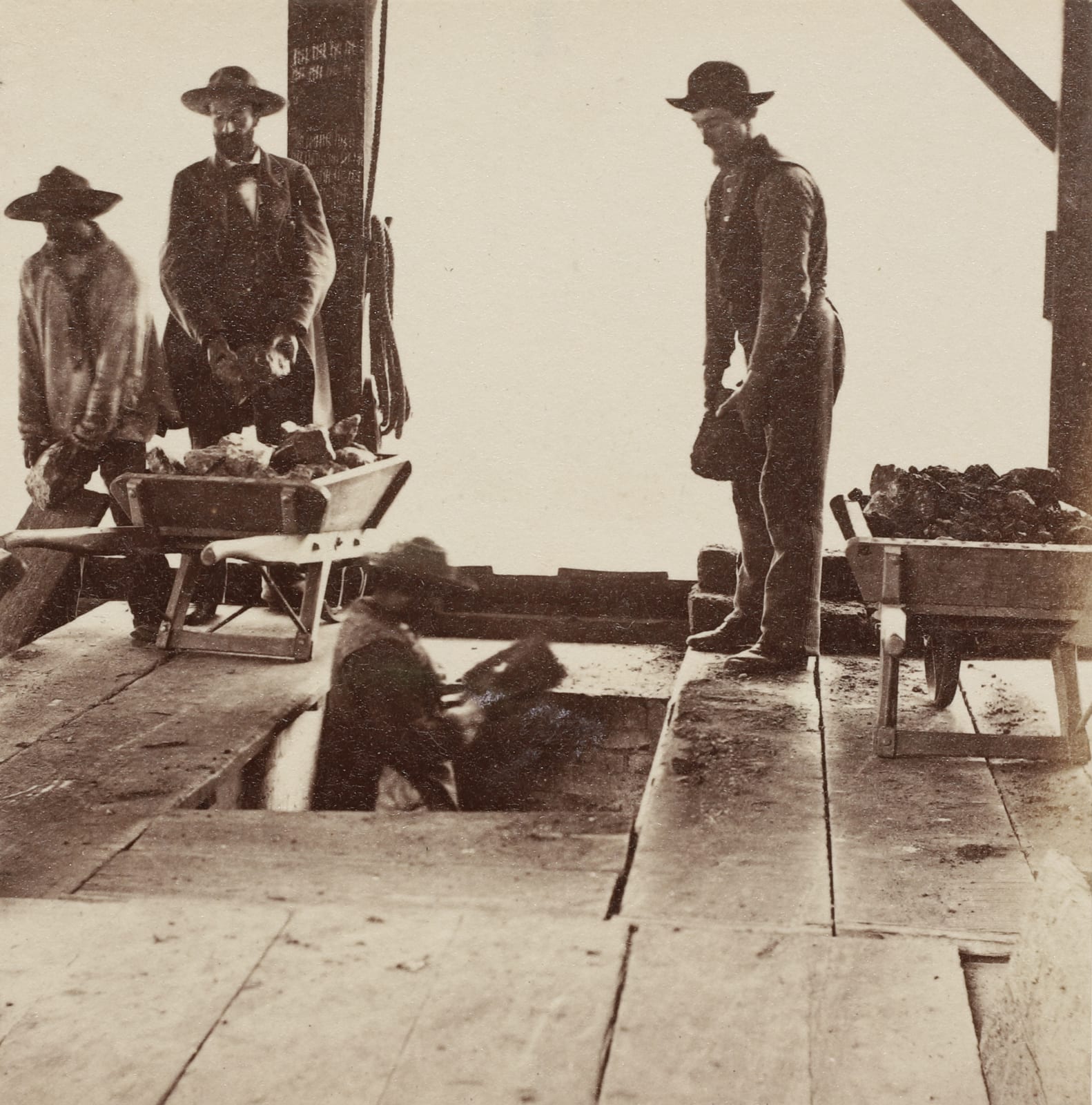 Carleton Watkins, Charging the Furnaces, New Almaden, 1863