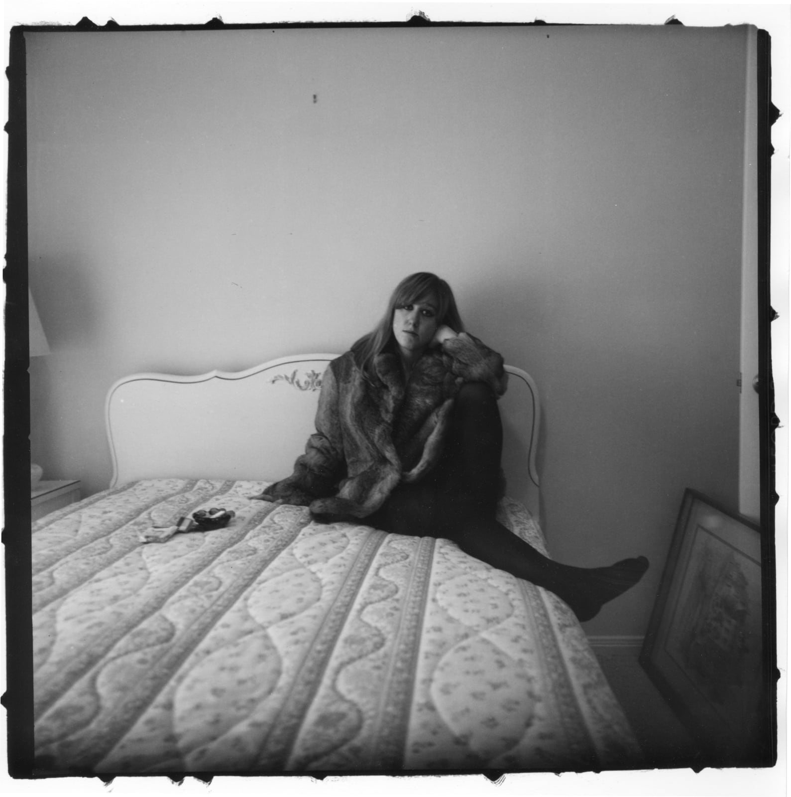 Emily Peacock, Girl in a coat lying on her bed, N.Y.C. (You, Me & Diane), 2012